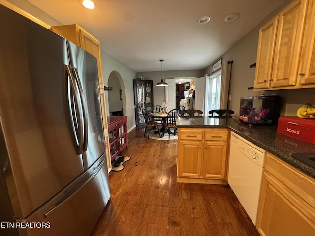 1347 Leffle Webb Rd, Crossville, TN 38572 - kitchen with a peninsula, dishwasher, dark wood finished floors, arched walkways, and freestanding refrigerator