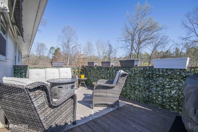 deck with a fire pit