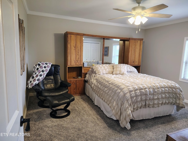 bedroom featuring baseboards, ornamental molding, a ceiling fan, and light colored carpet