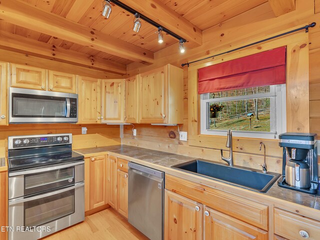 2164 Newt Huff Ln, Sevierville, TN 37862 - kitchen featuring wooden ceiling, a sink, beam ceiling, light brown cabinets, and appliances with stainless steel finishes