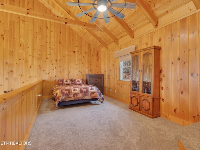 2164 Newt Huff Ln, Sevierville, TN 37862 - carpeted bedroom featuring vaulted ceiling with beams, wooden walls, wooden ceiling, and baseboards