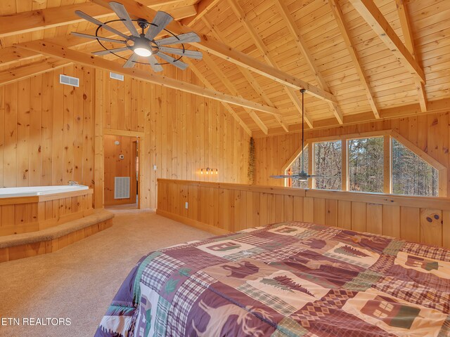 2164 Newt Huff Ln, Sevierville, TN 37862 - carpeted bedroom with visible vents, wooden walls, beam ceiling, and wood ceiling