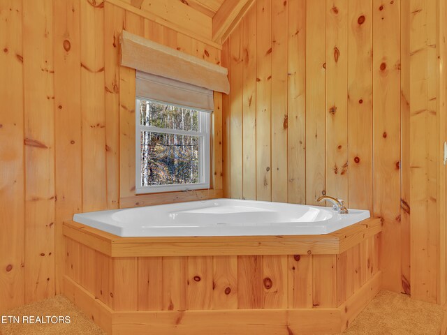 2164 Newt Huff Ln, Sevierville, TN 37862 - full bath with wooden walls and a garden tub