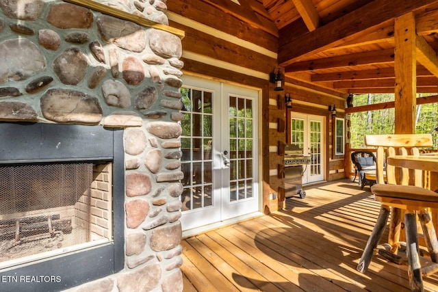 wooden terrace featuring french doors