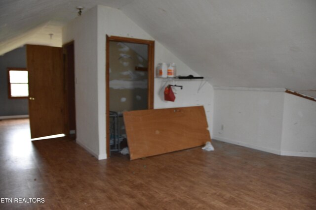 5128 Cove Creek Rd, Byrdstown, TN 38549 - additional living space with baseboards, lofted ceiling, and wood finished floors