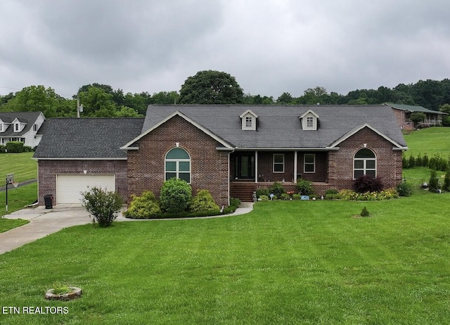 891 Forgety Rd, Jefferson City, TN 37760 - view of front of property with brick siding, covered porch, a front lawn, and an attached garage