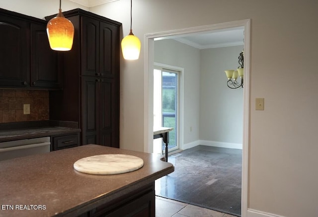 891 Forgety Rd, Jefferson City, TN 37760 - kitchen with dark countertops, ornamental molding, tasteful backsplash, decorative light fixtures, and a chandelier