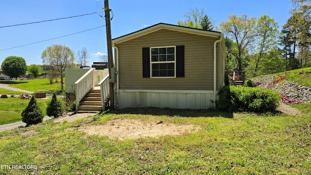 exterior space with a front yard