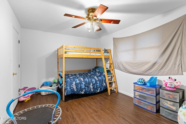 bedroom featuring ceiling fan and wood finished floors