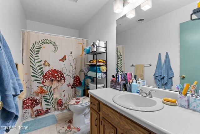 full bath with toilet, curtained shower, vanity, tile patterned flooring, and visible vents