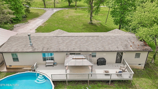 160 Walnut Ln, Rutledge, TN 37861 - back of property featuring a yard, a wooden deck, a shingled roof, and crawl space
