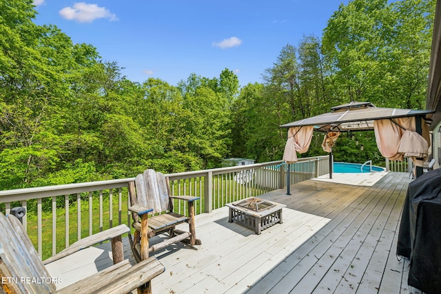 160 Walnut Ln, Rutledge, TN 37861 - wooden deck with a gazebo and a fire pit