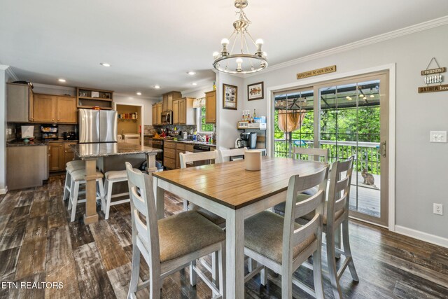 160 Walnut Ln, Rutledge, TN 37861 - dining area with recessed lighting, an inviting chandelier, crown molding, dark wood-style floors, and baseboards