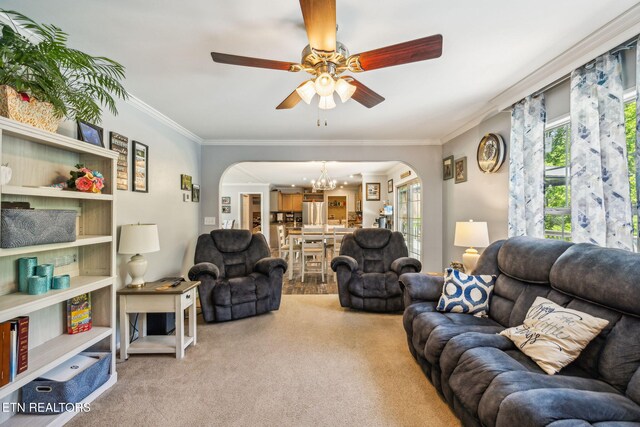 160 Walnut Ln, Rutledge, TN 37861 - living area featuring arched walkways, light carpet, crown molding, and ceiling fan with notable chandelier