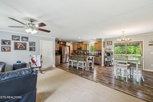 160 Walnut Ln, Rutledge, TN 37861 - living area featuring ceiling fan with notable chandelier, recessed lighting, baseboards, ornamental molding, and dark wood-style floors