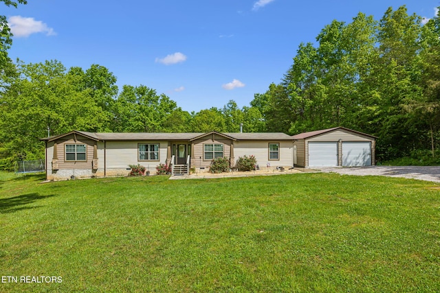 160 Walnut Ln, Rutledge, TN 37861 - view of front of home featuring crawl space, a detached garage, a front lawn, and gravel driveway