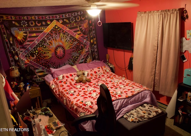 bedroom featuring baseboard heating