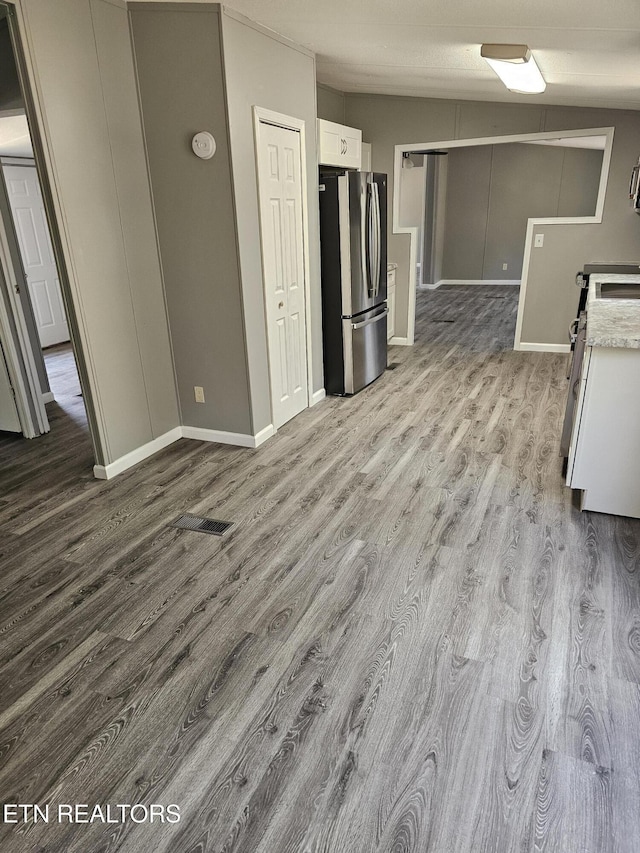 367 Mcjunkin Rd, Tellico Plains, TN 37385 - kitchen with white cabinets, visible vents, light countertops, wood finished floors, and stainless steel appliances