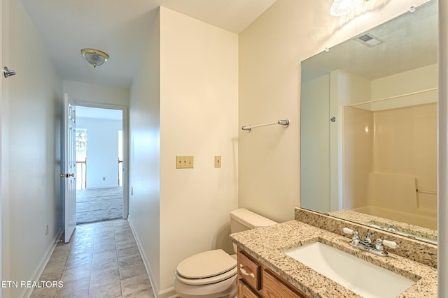 bathroom featuring visible vents, baseboards, toilet, tile patterned floors, and vanity