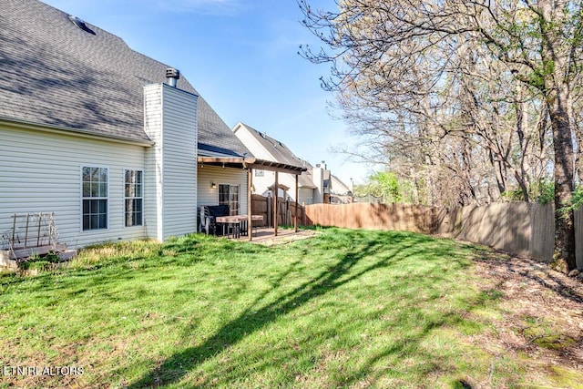 view of yard featuring a fenced backyard and a patio