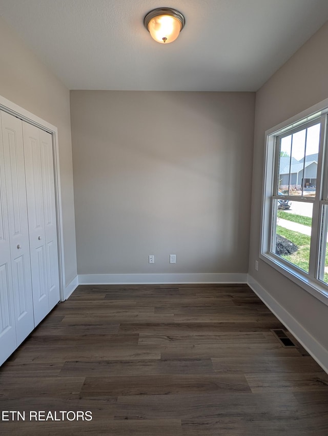 112 Roseberry St Lot 7B, Oak Ridge, TN 37830 - unfurnished bedroom with a closet and dark wood-style floors