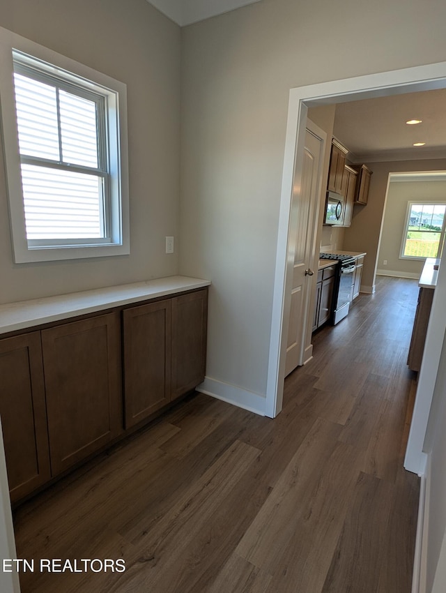 112 Roseberry St Lot 7B, Oak Ridge, TN 37830 - kitchen with stainless steel appliances, dark wood-style floors, light countertops, and brown cabinets