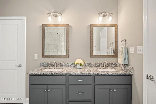 full bath featuring double vanity and a sink