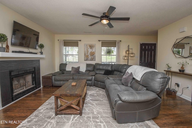 5836 Windtree Ln, Knoxville, TN 37921 - living area with wood finished floors, ceiling fan, and a fireplace