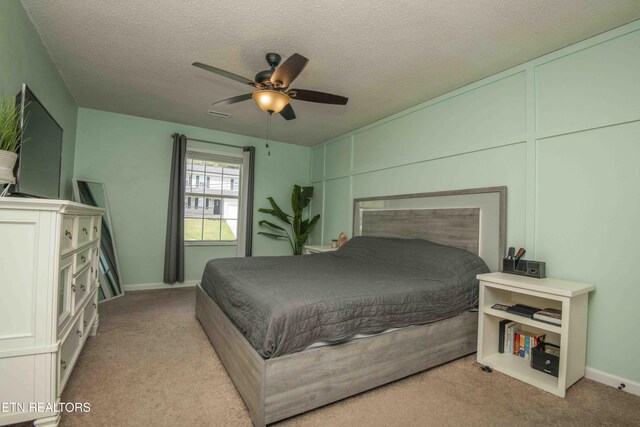 5836 Windtree Ln, Knoxville, TN 37921 - bedroom featuring carpet floors, ceiling fan, baseboards, and a textured ceiling