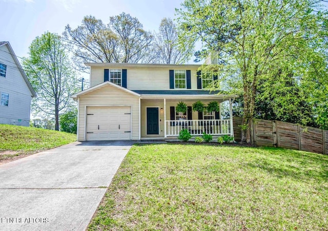5836 Windtree Ln, Knoxville, TN 37921 - traditional home featuring a porch, fence, a front lawn, an attached garage, and driveway
