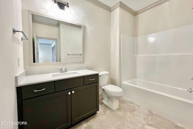 bathroom featuring toilet, vanity, ornamental molding, and tub / shower combination