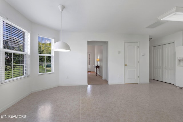 interior space with visible vents and baseboards