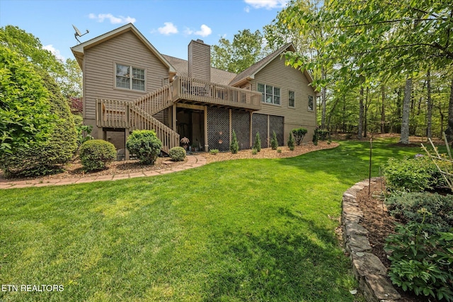 106 Mariners Dr, Fairfield Glade, TN 38558 - rear view of property with a chimney, stairway, a yard, and a deck