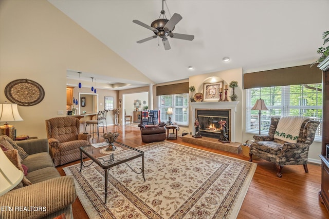 106 Mariners Dr, Fairfield Glade, TN 38558 - living area featuring a glass covered fireplace, plenty of natural light, hardwood / wood-style flooring, and ceiling fan
