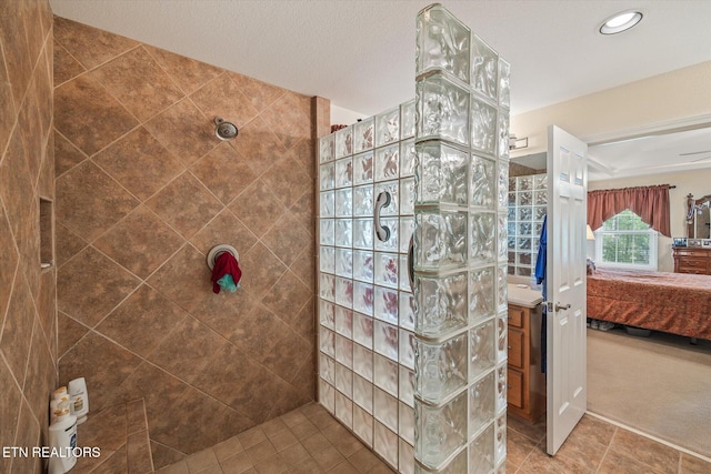 106 Mariners Dr, Fairfield Glade, TN 38558 - ensuite bathroom featuring tile patterned flooring, recessed lighting, walk in shower, and ensuite bath