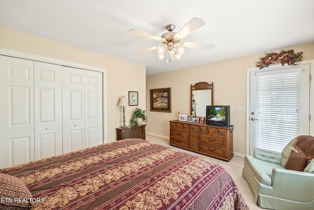 106 Mariners Dr, Fairfield Glade, TN 38558 - bedroom with baseboards, ceiling fan, light carpet, and a closet