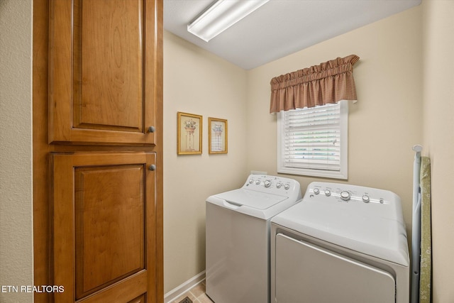 106 Mariners Dr, Fairfield Glade, TN 38558 - clothes washing area with laundry area and washing machine and clothes dryer