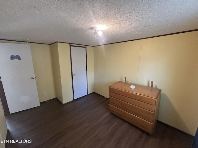 230 Hitch St, Vonore, TN 37885 - bedroom with a textured ceiling, wood finished floors, and crown molding