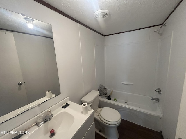 230 Hitch St, Vonore, TN 37885 - bathroom featuring vanity, toilet, bathing tub / shower combination, a textured ceiling, and visible vents