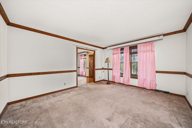 1441 Bunker Hill Rd, Cookeville, TN 38506 - unfurnished room with crown molding, a textured ceiling, baseboards, visible vents, and carpet
