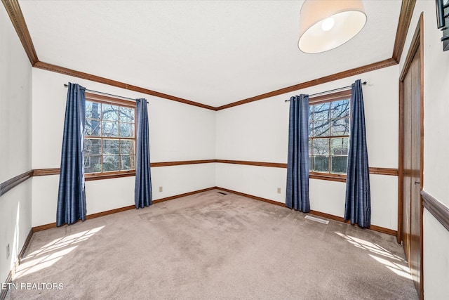 1441 Bunker Hill Rd, Cookeville, TN 38506 - empty room featuring baseboards, visible vents, carpet floors, and ornamental molding