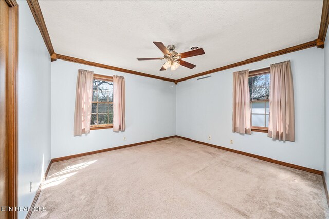 1441 Bunker Hill Rd, Cookeville, TN 38506 - unfurnished room with a ceiling fan, crown molding, a textured ceiling, and visible vents