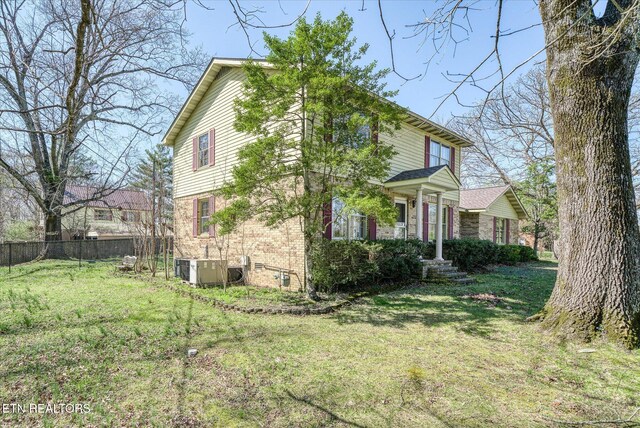 1441 Bunker Hill Rd, Cookeville, TN 38506 - exterior space with brick siding, fence, and a front lawn