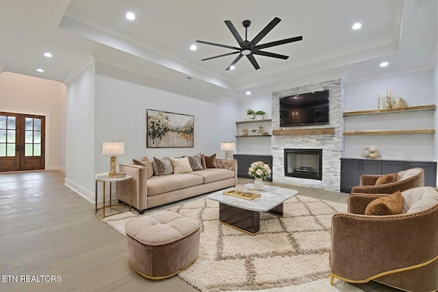 336 Nuhya Ln, Loudon, TN 37774 - living area featuring a tray ceiling, ceiling fan, wood finished floors, recessed lighting, and baseboards