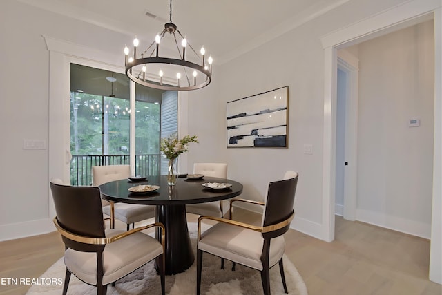 336 Nuhya Ln, Loudon, TN 37774 - dining room with a chandelier, light wood-type flooring, and baseboards