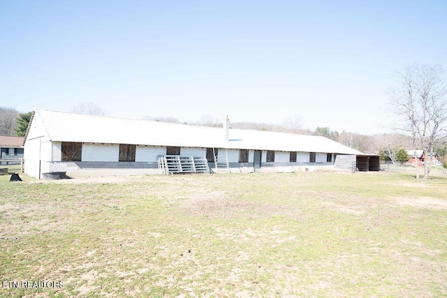 view of front facade with an outbuilding