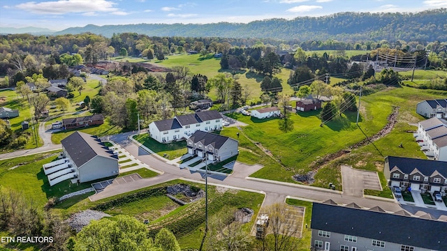 drone / aerial view featuring a mountain view and a residential view