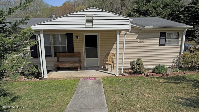 bungalow with a front yard