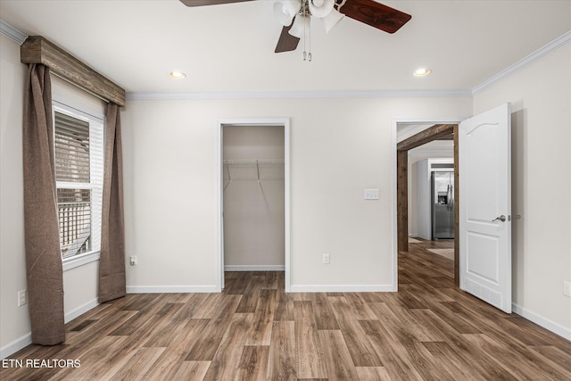 101 Woods Hollow Ln, Crossville, TN 38571 - unfurnished bedroom with visible vents, wood finished floors, ornamental molding, and stainless steel fridge