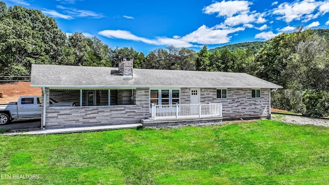 3177 Old Newport Hwy, Sevierville, TN 37876 - single story home featuring a chimney, a front yard, stone siding, and a shingled roof